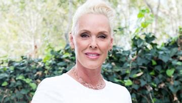 brigitte nielsen sexy|Brigitte Nielsen wows in swimsuit photo as she twins。